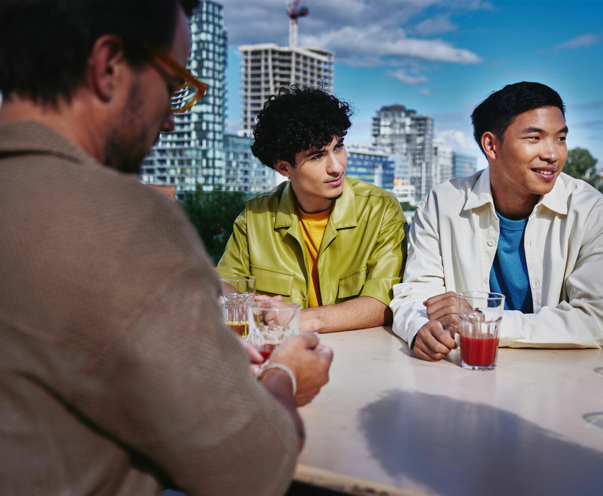 People in conversation at a table