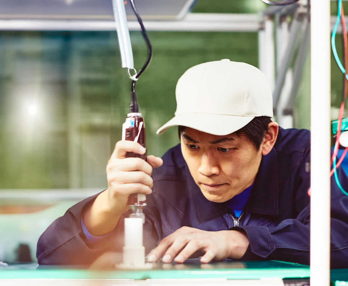 A man working with a tool